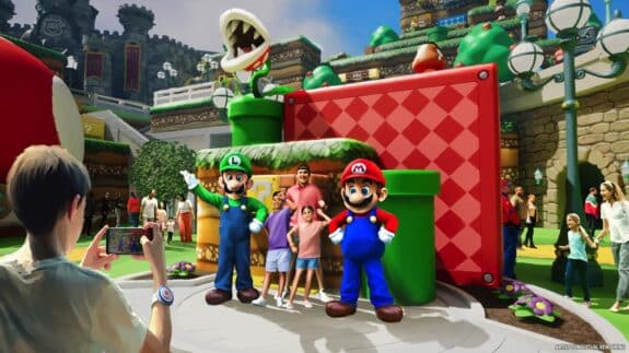 Super Mario and Luigi posing with guests