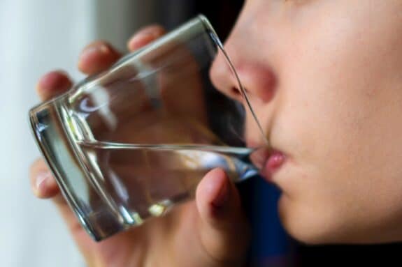 drinking pure water from glass