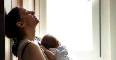 tired stress mom with baby