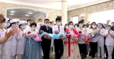 North Korean Family with their quintuplets
