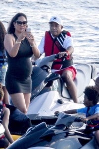 A pregnant Kimora Lee Simmons and Russell Simmons vacation in St