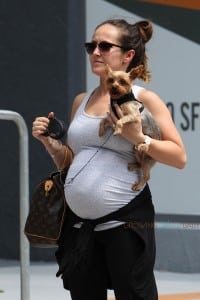 A very pregnant Ashley Hebert arrives in Miami, FL