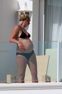 A very pregnant Kayte Grammer on the balcony of her hotel