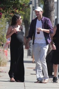 A very pregnant Mila Kunis and Ashton Kutcher out in LA