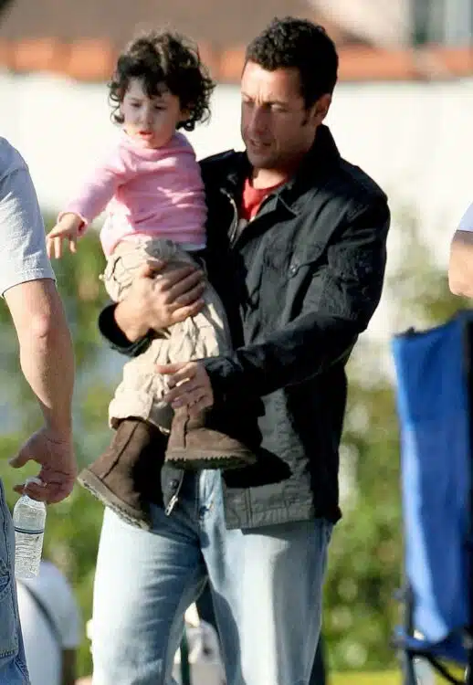 Adam Sandler plays with his daughter Sadie during a break from filming for his new movie "Bedtime Stories"