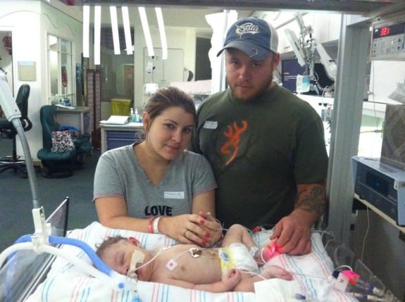 Allen Coats and his fiancee Rachel Melancon with their daughter Olivia