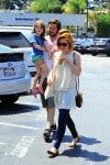 Alyson Hannigan, Alexis Denisof with Keeva and Satyana Denisof at the Brentwood Country Market