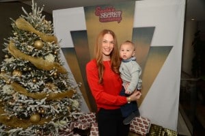 Amanda Righetti with her son Knox At the Secret Santa Workshop