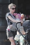 True Blood star Anna Paquin walks up and down Abbot Kinney with one of her babiess in a chest harness and the other in the stroller in Venice Beach