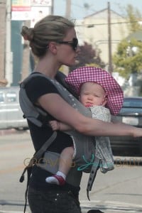 True Blood star Anna Paquin walks up and down Abbot Kinney with one of her babiess in a chest harness and the other in the stroller in Venice Beach