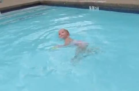 Baby Elizabeth swims the length of the pool