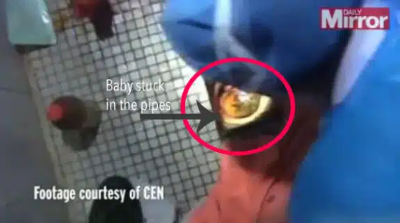 Baby rescued from bathroom pipes in China