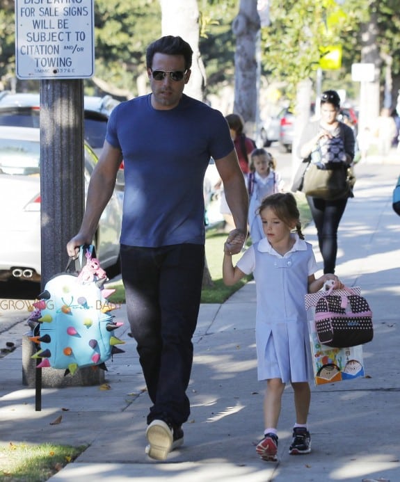 Ben Affleck carries fancy school bag of her daughter Seraphina as he picks her up from school in Los Angeles