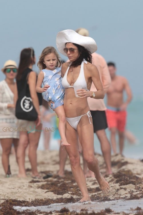 Bethenny Frankel and her boyfriend Michael Cerussi take her daughter Bryn for a day at the beach in Miami