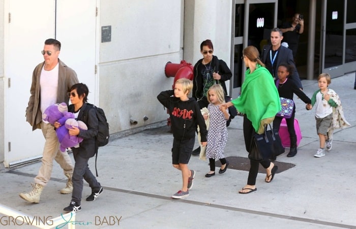 Brad Pitt and Angelina Jolie at LAX with kids Maddox, Zahara Pax, Shiloh, Vivienne and Knox