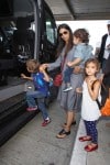 Camila Alves at the airport with kids Levi, Vida and Livingston McConaughey