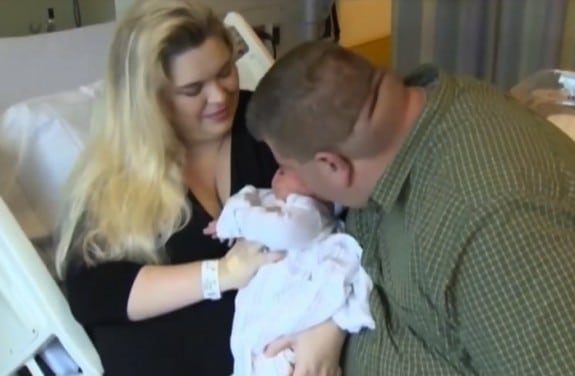 Caroline and Bryan Ruscak with their daughter Carisa