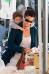 Carrie Anne Moss takes her daughter Frances Beatrice Roy to the Farmers Market in Pacific Palisades, Los Angeles