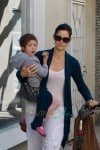 Carrie Anne Moss takes her daughter Frances Beatrice Roy to the Farmers Market in Pacific Palisades, Los Angeles