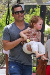 Cash Warren out at the park with daughter Haven