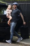 David Beckham Carries Harper in London