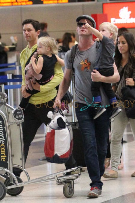 Neil Patrick Harris and David Burtka seen with their kids Gideon Scott and Harper Grace departing LAX