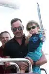 David Furnish with his son Zachary on a yacht in St