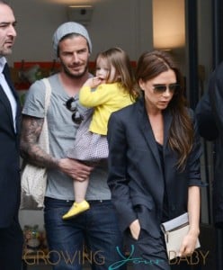 David & Victoria Beckham Take Harper Along While Shopping In Paris
