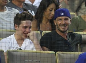 David and Brooklyn Beckham watch the Los Angeles Dodgers play the Atlanta Braves