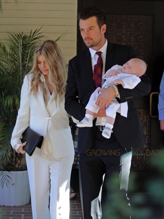 Fergie and Josh Duhamel with their son Axl at his baptism