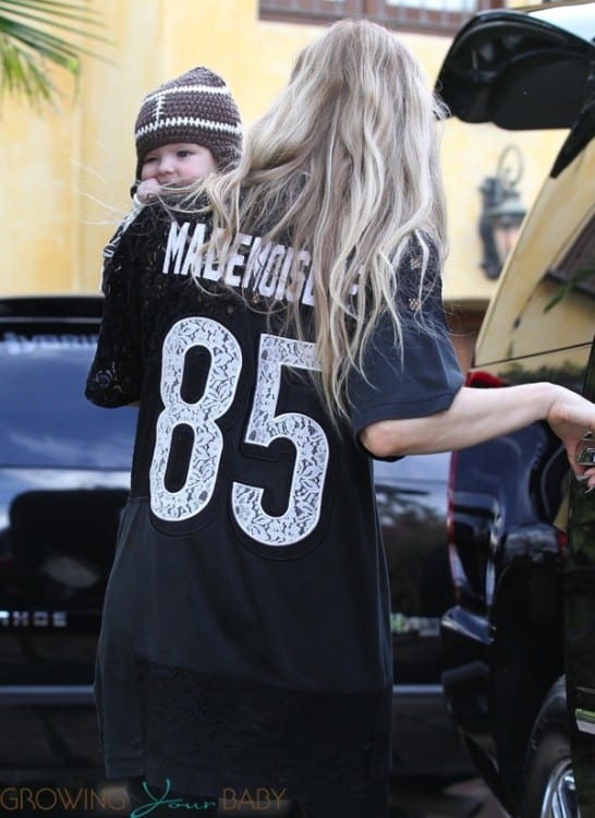 Fergie outside Super Bowl party with son AXL