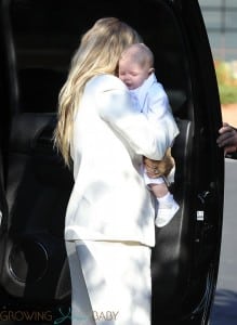 Fergie with son Axl at his baptism