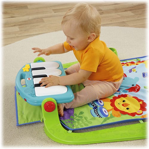 Fisher-Price Kick N Play Piano Gym - sitting at Piano