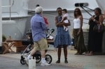 George Lucas and his wife Mellody Hobson with their daughter Everest  stroll in St