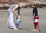 Gwen Stefani at the beach with sons Apollo and Kingston