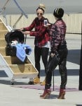 Gwen Stefani boards private jet with son Apollo