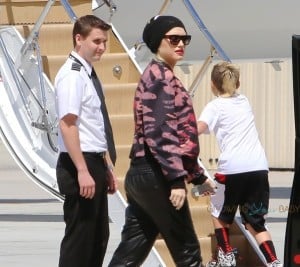 Gwen Stefani boards private jet with son Kingston