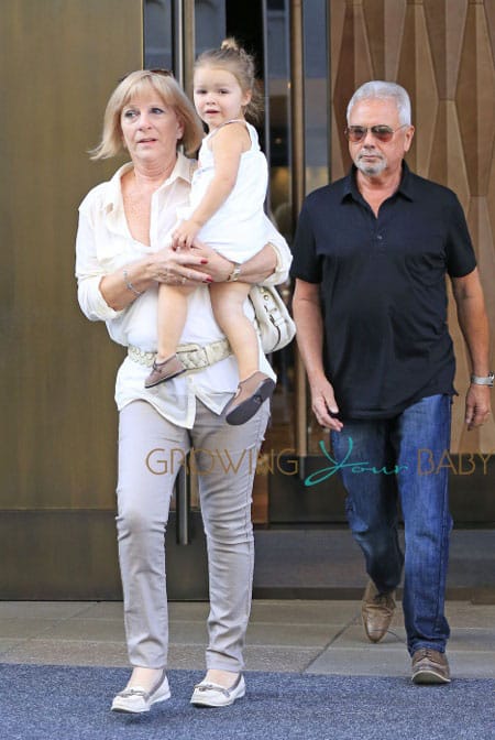 Harper Beckham seen with grandparents Jacqueline Doreen and Anthony Adams at the SoHo Trump in New York City