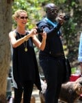 Heidi Klum and Seal take pictures of their boys at the soccer field