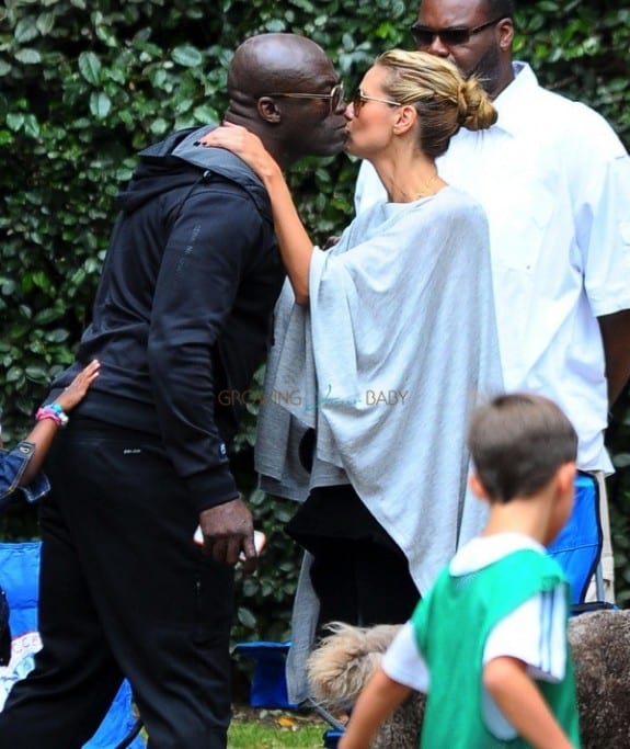 Heidi Klum kisses Seal at the soccer field