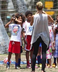 Heidi Klum takes a picture of her boys Johan and Henry at the soccer field