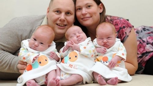 Ian and Karen Gilbert with their triplets