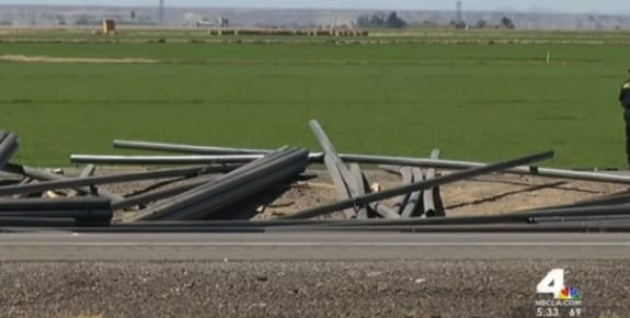 Image of scene - bus accident rebar on road