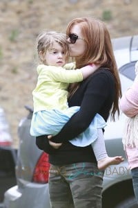 Isla Fisher attends a birthday party with daughters, Olive Cohen and Elula Lottie Miriam Cohen, at The Coldwater Park in Beverly Hills