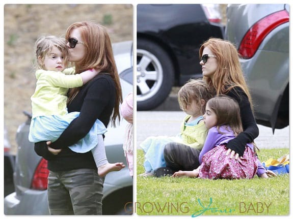 Isla Fisher at a birthday party with daughters Elula and Olive Cohen