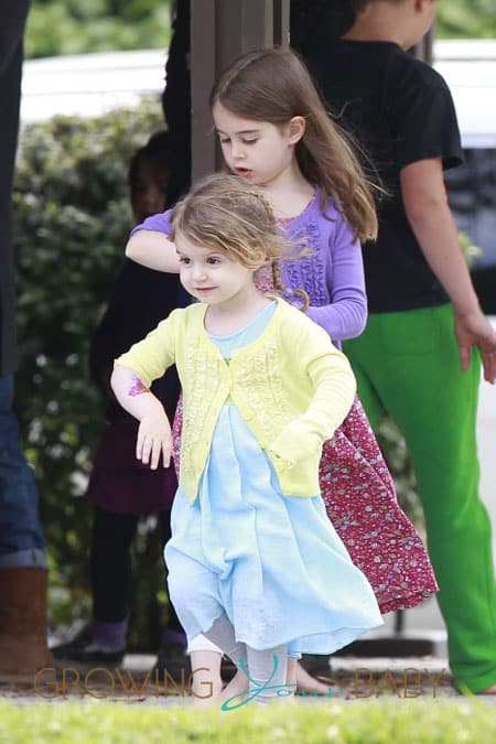 Isla Fisher attends a birthday party with daughters, Olive Cohen and Elula Lottie Miriam Cohen, at The Coldwater Park in Beverly Hills