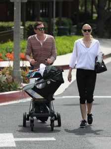 Jaime King and Kyle Newman out at the park with son James