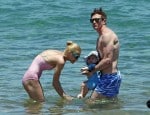 Jaime King and Kyle Newman with son James at the beach in Maui