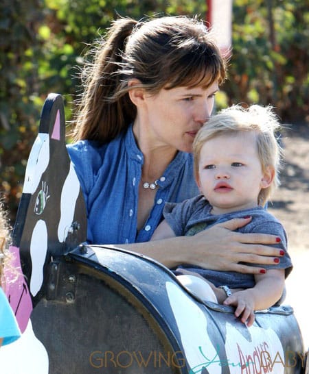 Jennifer Garner and her son Samuel ride the cow train at the pumpkin patch