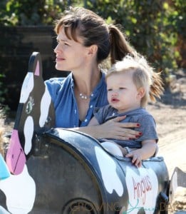 Jennifer Garner and her son Samuel ride the cow train at the pumpkin patch